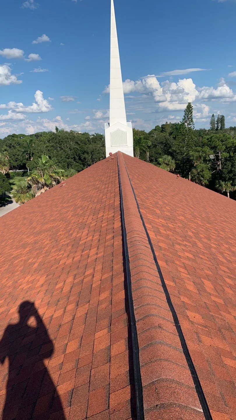 A person's shadow on the roof of a church, captured as an optimized visual for SEO marketing.